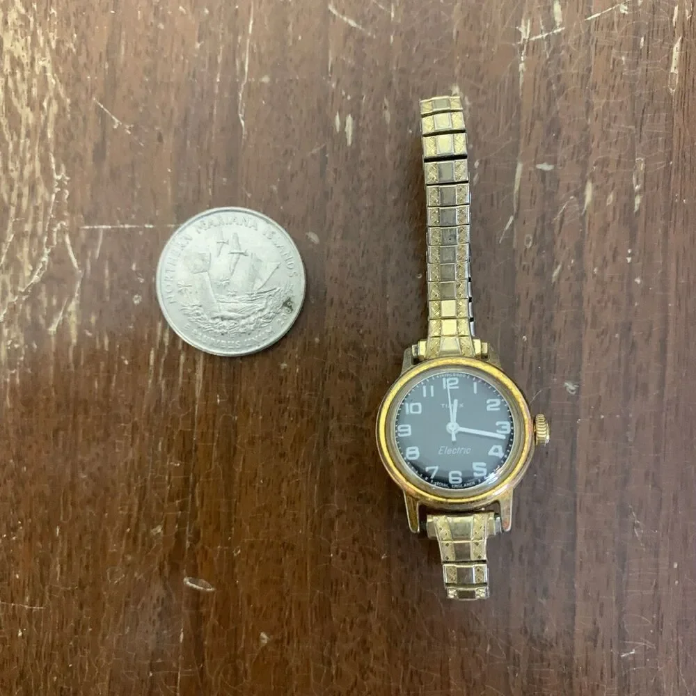 Vintage Women's Gold Timex Electric Analog Black‎ Face Speidel band Wrist Watch
